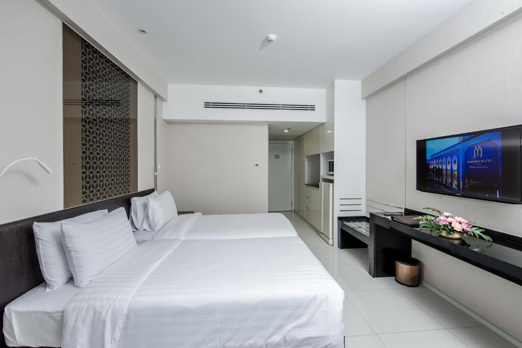 Двухместный (Двухместный номер Делюкс с 1 кроватью или 2 отдельными кроватями) отеля Mandarin Hotel Managed by Centre Point, Бангкок
