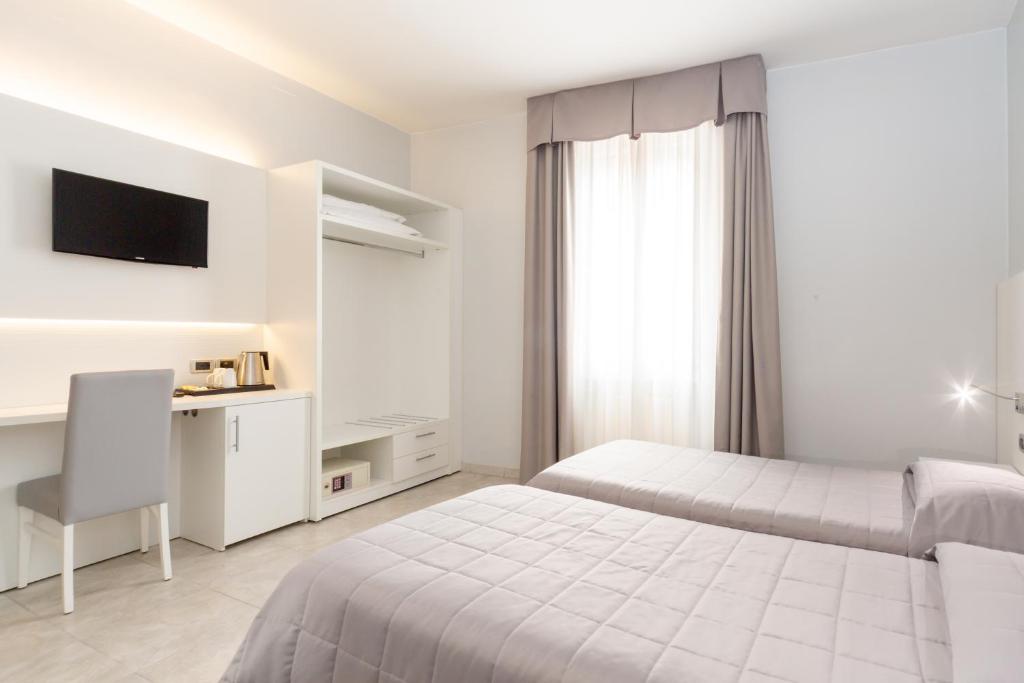 Двухместный (Двухместный номер с 2 отдельными кроватями) отеля Hotel University, Болонья