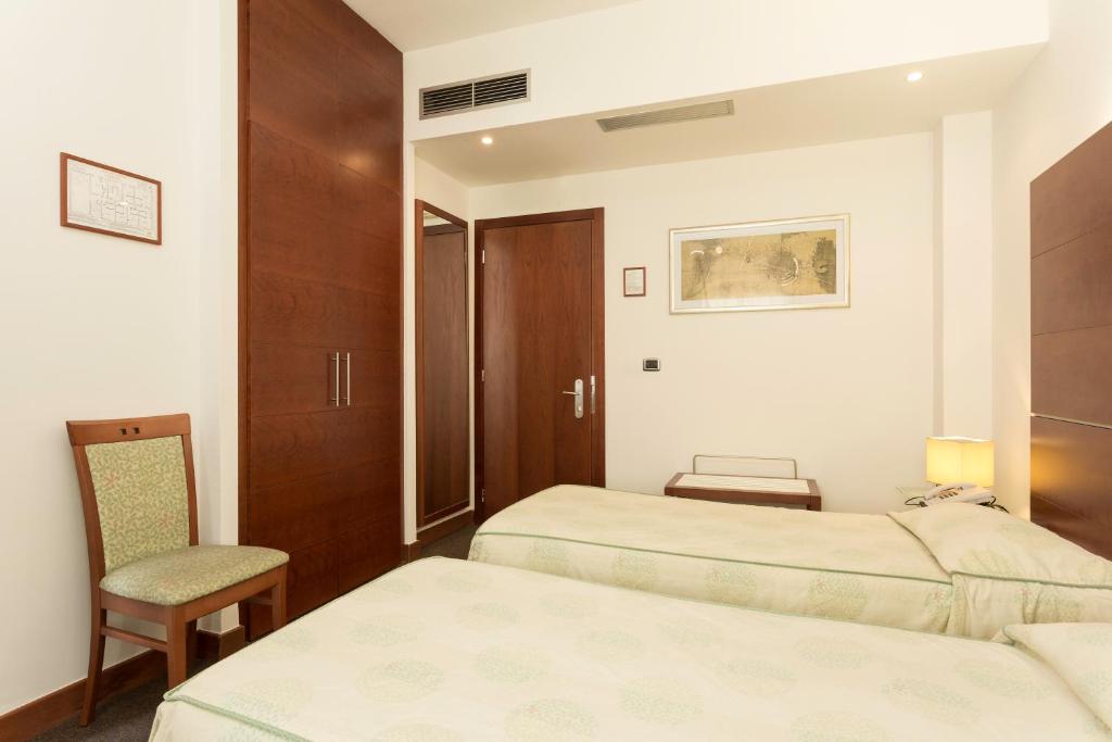 Двухместный (Двухместный номер с 2 отдельными кроватями) отеля Millennhotel, Болонья