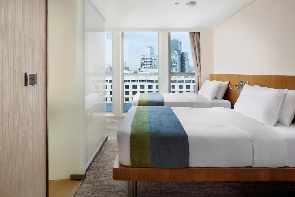 Двухместный (Двухместный номер Делюкс с 1 кроватью или 2 отдельными кроватями (Только для женщин)) отеля Summit View Kowloon, Гонконг (город)