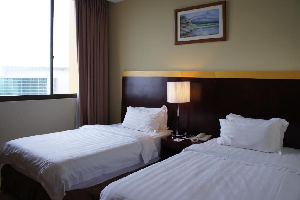 Двухместный (Двухместный номер Делюкс с 1 кроватью или 2 отдельными кроватями) отеля Gaya Centre Hotel, Кота-Кинабалу