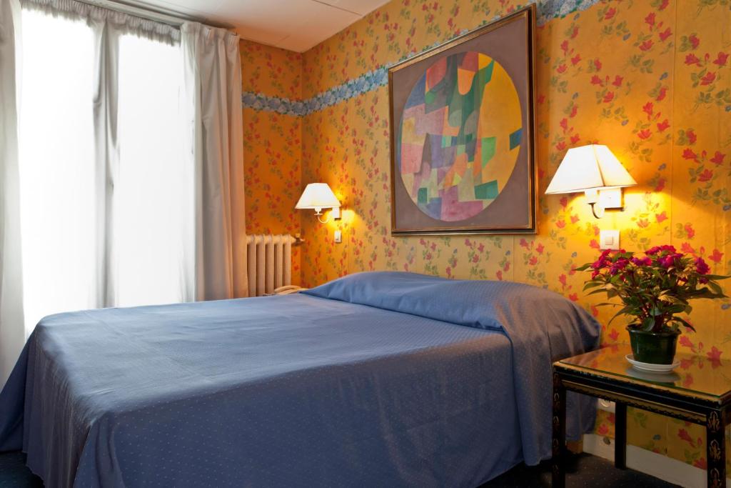 Двухместный (Улучшенный двухместный номер с 1 кроватью или 2 отдельными кроватями) отеля Hotel Agora, Париж