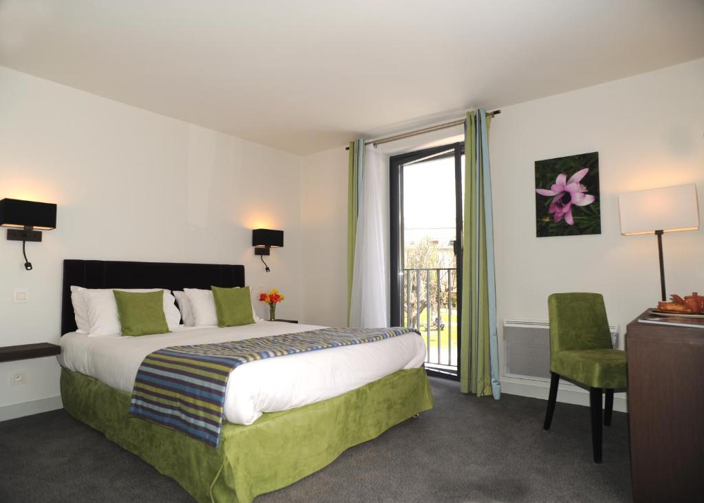 Двухместный (Улучшенный двухместный номер с 1 кроватью или 2 отдельными кроватями) отеля Hotel Les Lanchers, Шамони-Мон-Блан