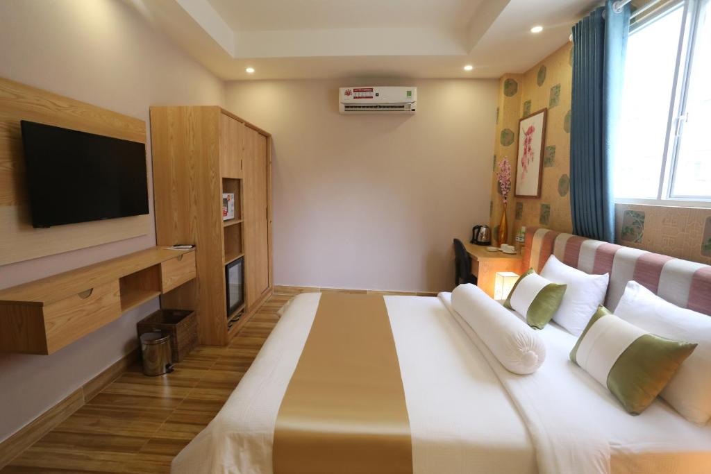 Двухместный (Двухместный номер Делюкс с 1 кроватью) отеля Thuy Sakura Hotel, Хошимин