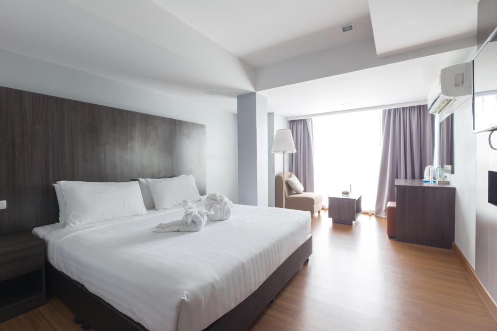 Двухместный (Улучшенный двухместный номер с 1 кроватью или 2 отдельными кроватями) отеля Top View Residence, Чонбури
