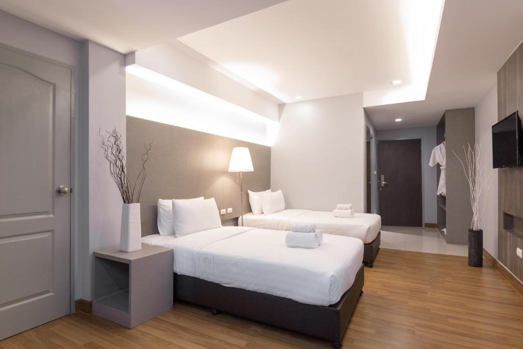 Двухместный (Двухместный номер Делюкс с 1 кроватью или 2 отдельными кроватями) отеля Top View Residence, Чонбури