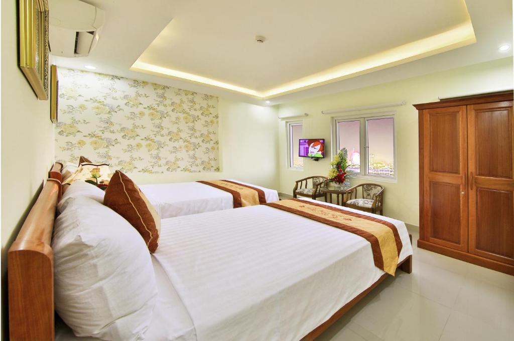 Двухместный (Улучшенный двухместный номер с 1 кроватью) отеля Sen Vang Hotel, Дананг