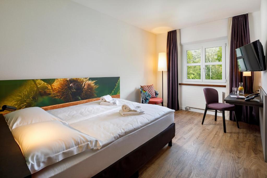 Двухместный (Queen Room with Air Conditioning - Disability Access) отеля Bellinzona Sud Swiss Quality Hotel, Беллинцона