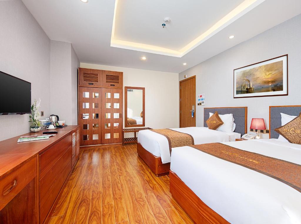 Двухместный (Двухместный номер Делюкс с 2 отдельными кроватями) отеля Mercury Boutique Hotel, Дананг