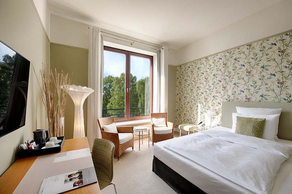 Двухместный (Улучшенный двухместный номер с 1 кроватью или 2 отдельными кроватями) отеля Privathotel Lindtner Hamburg, Гамбург