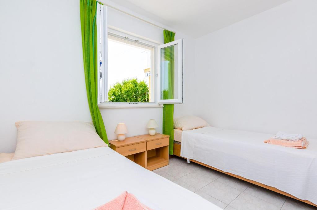 Двухместный (Двухместный номер с 2 отдельными кроватями, патио и видом на сад) гостевого дома Rooms Villa Bind, Цавтат
