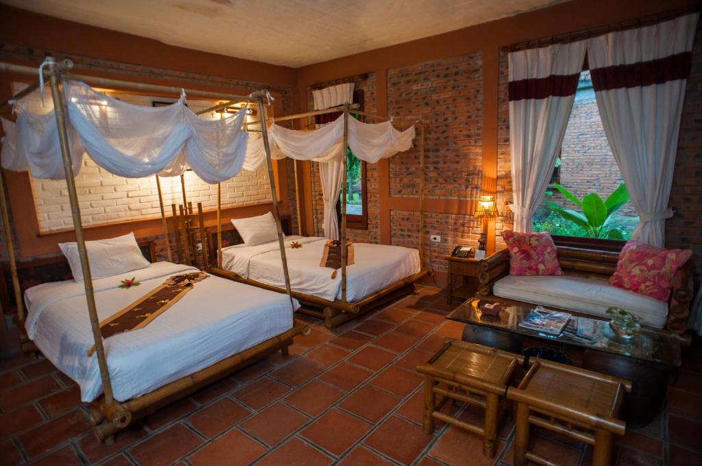 Двухместный (Улучшенный двухместный номер с 1 кроватью или 2 отдельными кроватями и видом на море) курортного отеля Van Chai Resort, Тхань Хоа