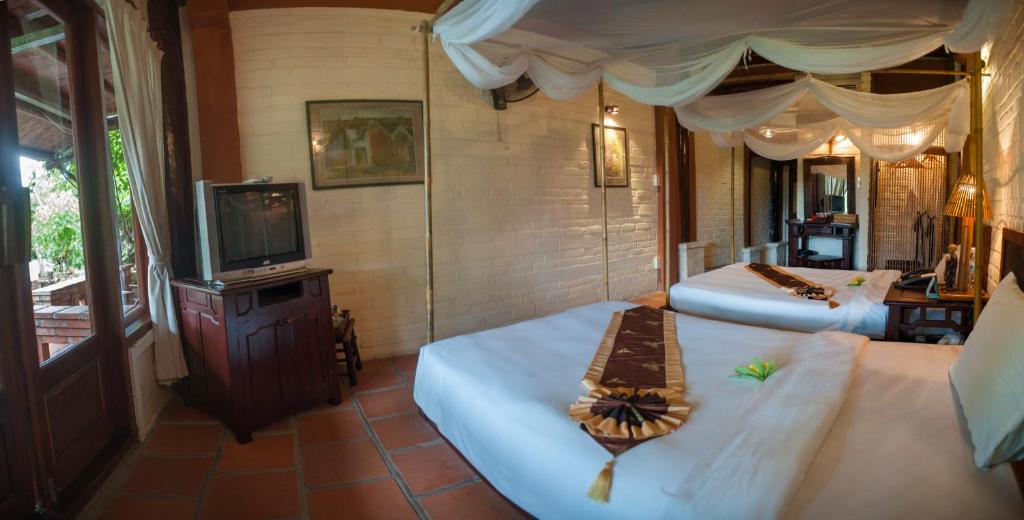 Двухместный (Двухместный номер Делюкс с 1 кроватью или 2 отдельными кроватями, вид на сад) курортного отеля Van Chai Resort, Тхань Хоа