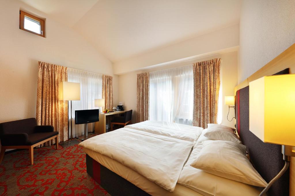 Двухместный (Улучшенный двухместный номер с 1 кроватью) отеля Hotel Garni Testa Grigia, Церматт