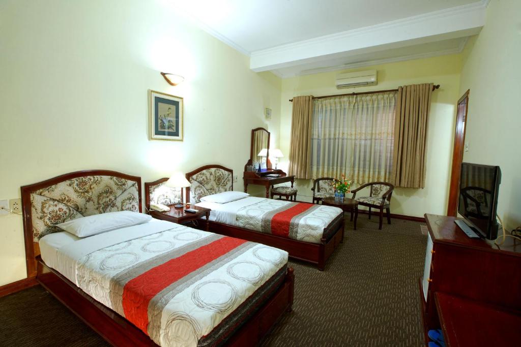 Двухместный (Улучшенный двухместный номер с 1 кроватью) отеля Hoang Ha Hotel, Хошимин