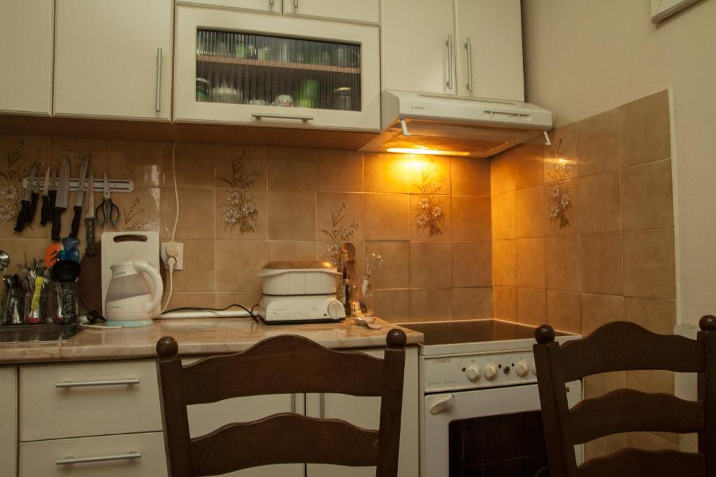 Апартаменты (Семейные апартаменты (2 взрослых + 4 детей)) апартамента Apartments Maslina, Херцег-Нови