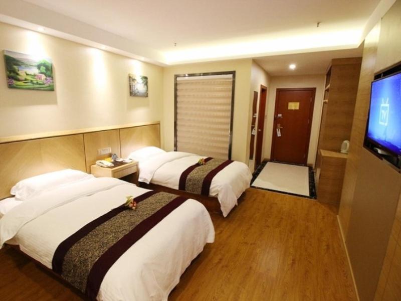 Двухместный (Для граждан материкового Китая - Двухместный номер Делюкс с 2 отдельными кроватями) отеля GreenTree Inn JiangSu WuXi HuiShan High-speed Rail QianZhou ChongWen Road Business Hotel, Уси