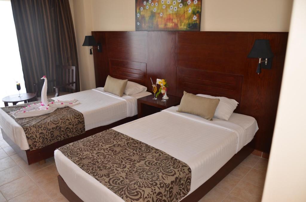 Двухместный (Стандартный двухместный номер с 1 кроватью или 2 отдельными кроватями) курортного отеля Royal Brayka Beach Resort, Абу-Дабаб