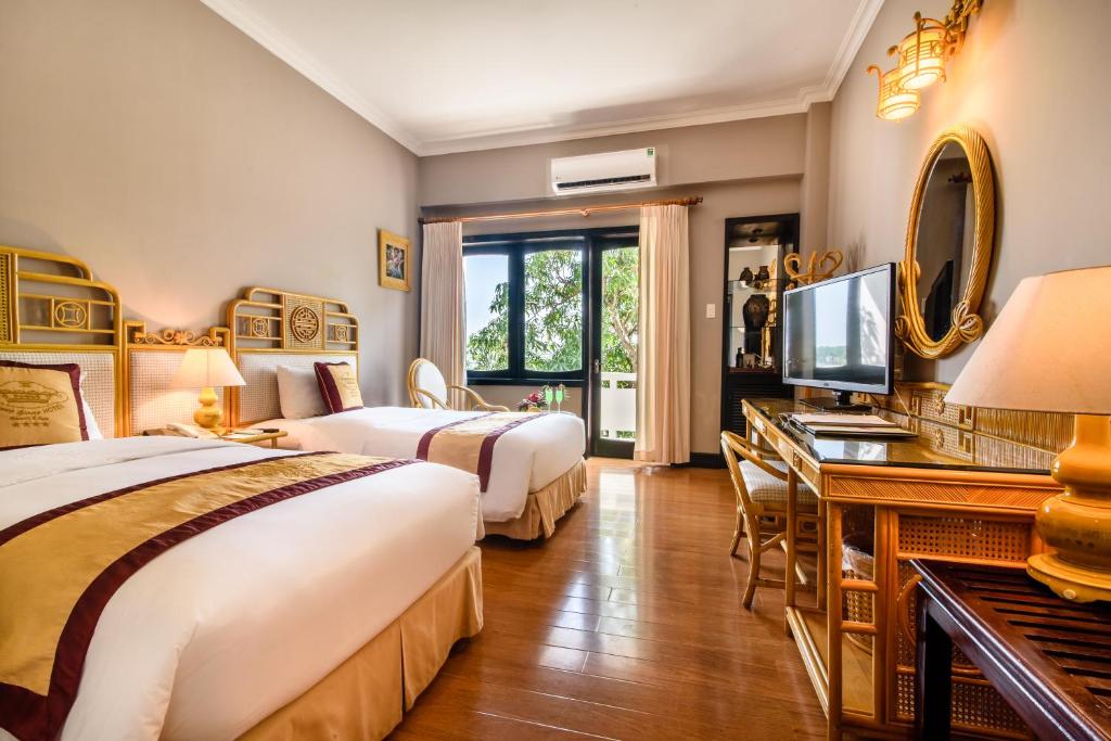 Двухместный (Двухместный номер Делюкс с 1 кроватью или 2 отдельными кроватями, вид на сад) курортного отеля Huong Giang Hotel Resort & Spa, Хюэ