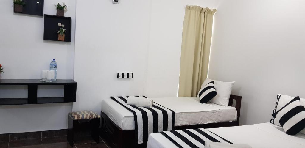 Трехместный (Классический трехместный номер) курортного отеля City Resort, Анурадхапура