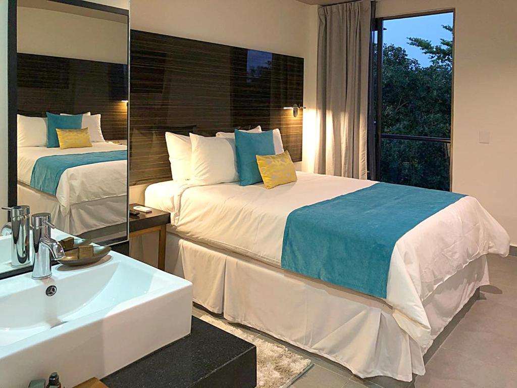 Двухместный (Номер Делюкс с кроватью размера «queen-size») отеля Kabah Boutique Hotel, Канкун