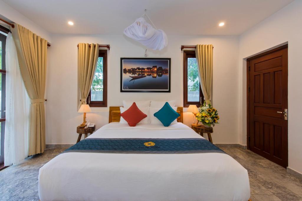 Двухместный (Двухместный номер Делюкс с 1 кроватью или 2 отдельными кроватями, вид на сад) курортного отеля Louis Villa Hoi An, Хойан