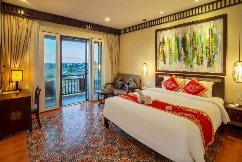 Двухместный (Номер Делюкс с балконом и видом на рисовое поле) курортного отеля Hoi An Field Villa & Spa, Хойан