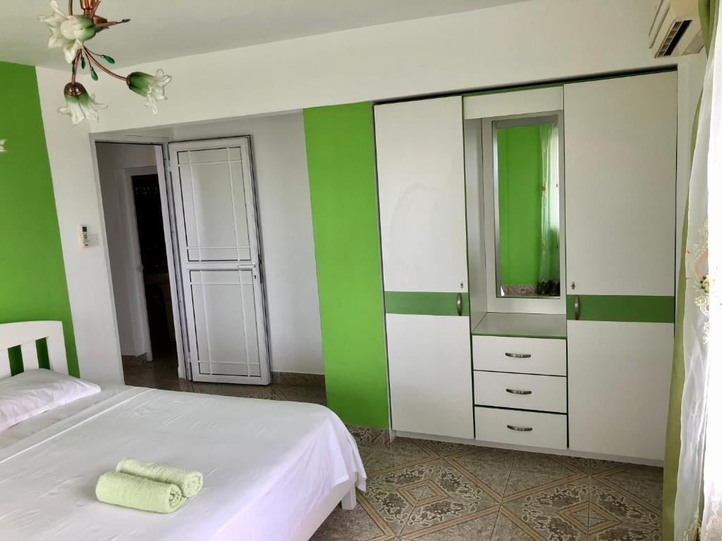 Апартаменты (Апартаменты Делюкс с 2 спальнями) гостевого дома Sunshine Villa Mauritius, Флик-эн-Флак