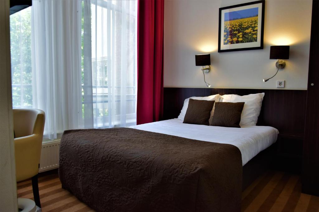 Двухместный (Небольшой двухместный номер с 1 кроватью, вид на сад) отеля Prinsengracht Hotel, Амстердам