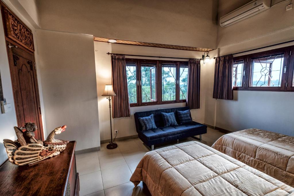 Двухместный (Улучшенный двухместный номер с 2 отдельными кроватями и видом на сад) отеля Murni's Houses & Spa, Убуд