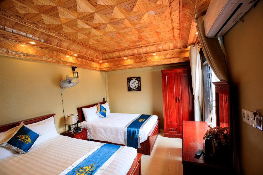 Четырехместный (Номер с 2 кроватями размера «king-size») отеля Mimosa Hotel Sapa, Сапа