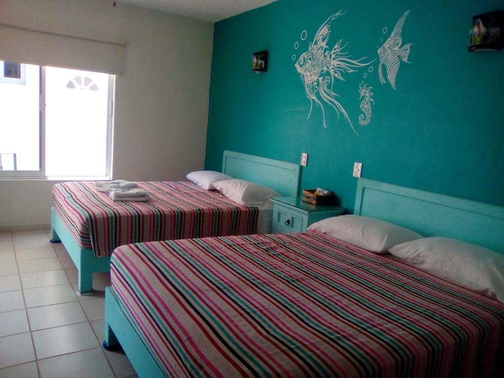 Двухместный (Двухместный номер с 2 отдельными кроватями) отеля Hotel Quinta Mar y Selva, Чакала