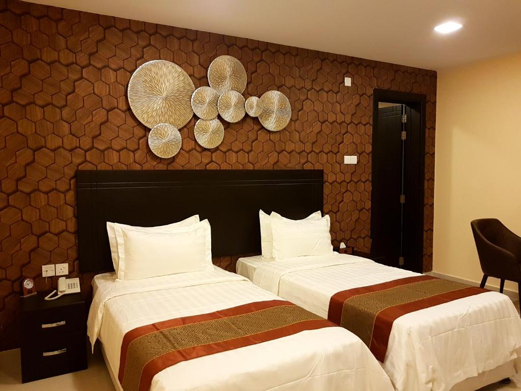 Двухместный (Стандартный двухместный номер с 2 отдельными кроватями) отеля Tanuf Residency Hotel, Низва