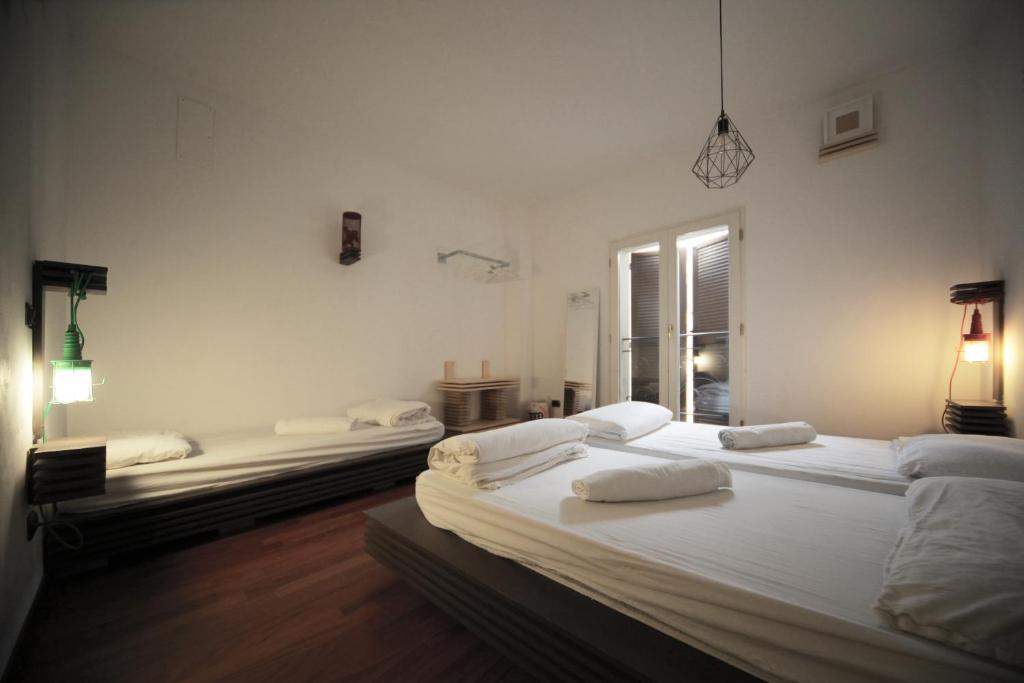 Трехместный (Трехместный номер с общей ванной комнатой) хостела Dopa Hostel, Болонья