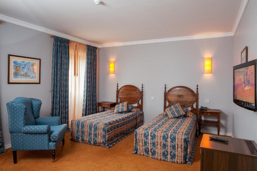 Двухместный (Двухместный номер с 1 кроватью или 2 отдельными кроватями) отеля Hotel do Elevador, Брага