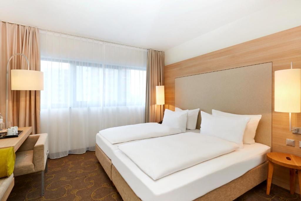 Двухместный (Двухместный номер «Комфорт» с 1 кроватью или 2 отдельными кроватями) отеля H+ Hotel Salzburg, Зальцбург