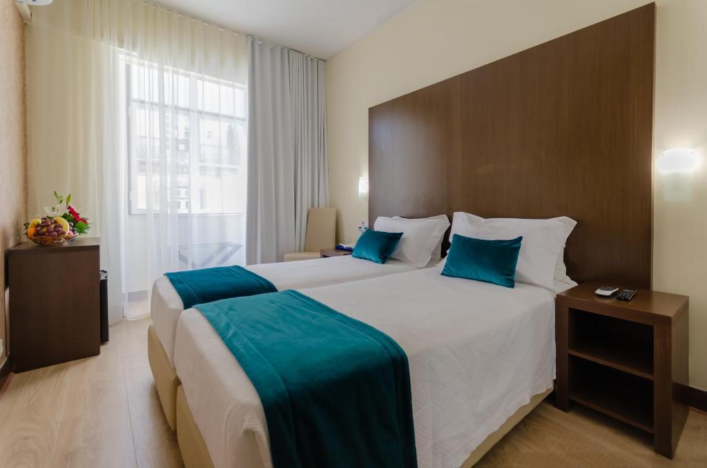 Двухместный (Двухместный номер с 2 отдельными кроватями) отеля Hotel LX Rossio, Лиссабон