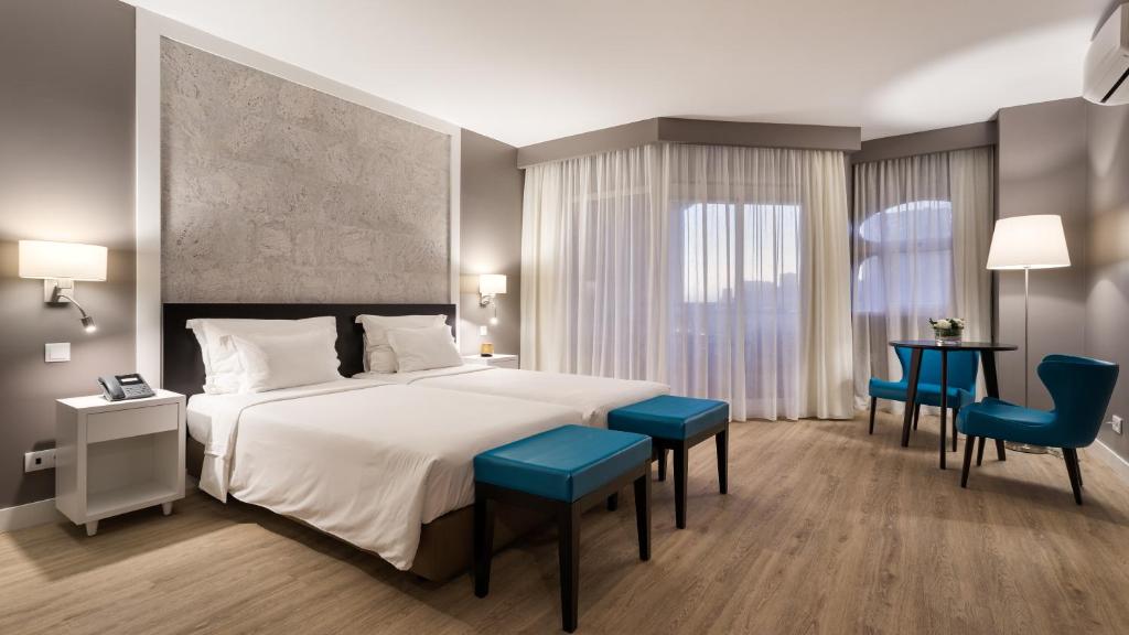 Двухместный (Двухместный номер с 1 кроватью или 2 отдельными кроватями и видом на сушу) отеля Hotel Oriental - Adults Only, Портиман