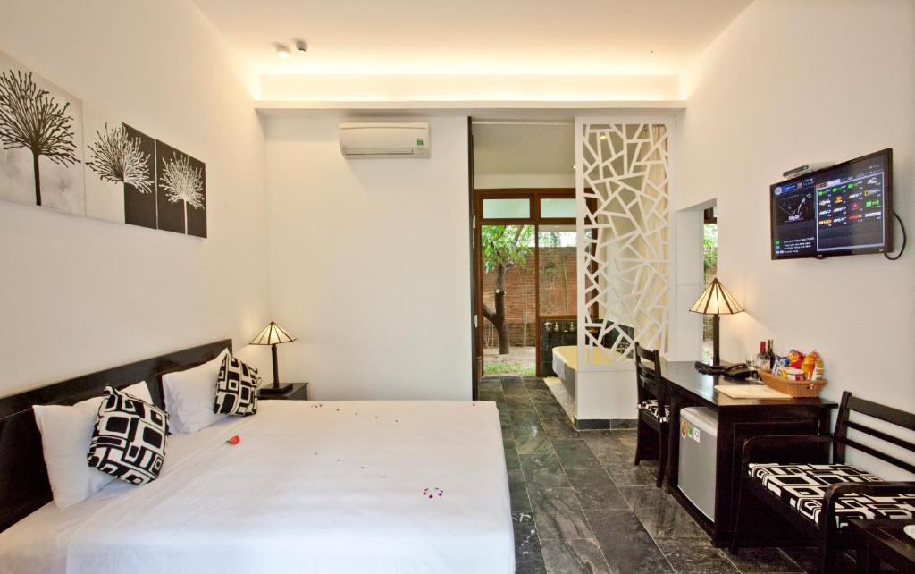 Двухместный (Классический двухместный номер Делюкс с 1 кроватью или 2 отдельными кроватями) виллы Hoi An TNT Villa, Хойан
