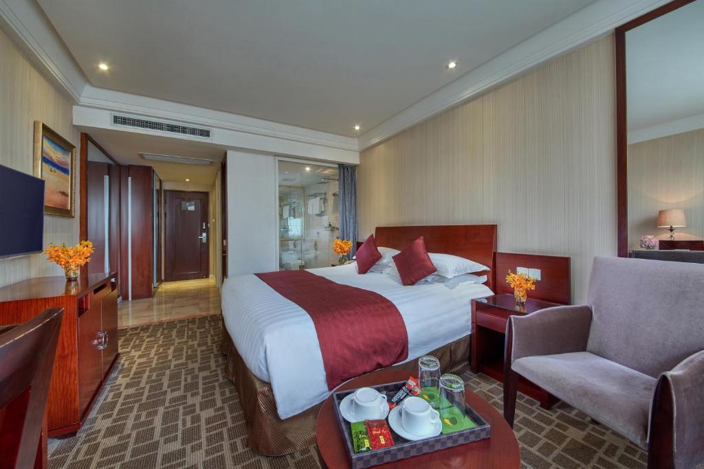 Двухместный (Двухместный номер Делюкс с 1 кроватью) отеля New Century Manju Hotel·Shanghai Railway Station, Шанхай