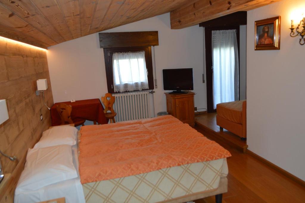 Двухместный (Двухместный номер с 1 кроватью или 2 отдельными кроватями) отеля Hotel Montana, Кортина-д'Ампеццо