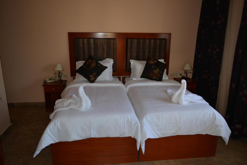 Двухместный (Двухместный номер с 1 кроватью или 2 отдельными кроватями) отеля Americana Hotel, Кос