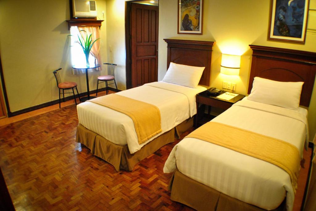 Двухместный (Двухместный номер Делюкс с 2 отдельными кроватями) отеля Fersal Hotel - P. Tuazon Cubao, Манила