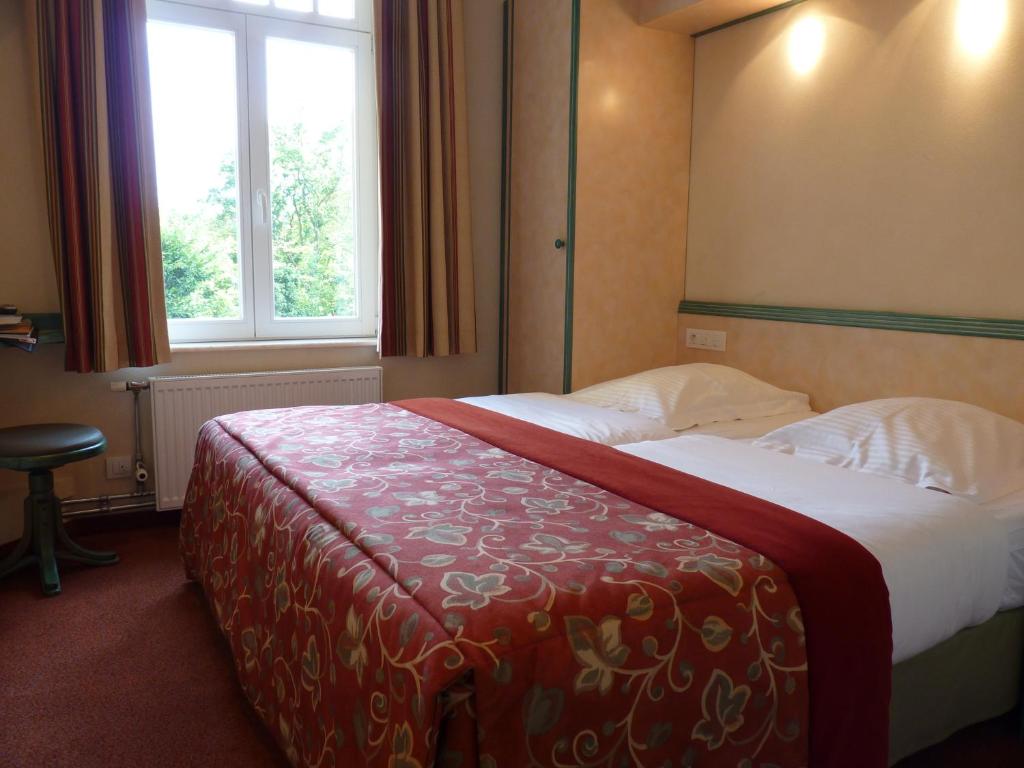 Двухместный (Стандартный двухместный номер с 1 кроватью или 2 отдельными кроватями) отеля Les Tilleuls Hotel, Рандё