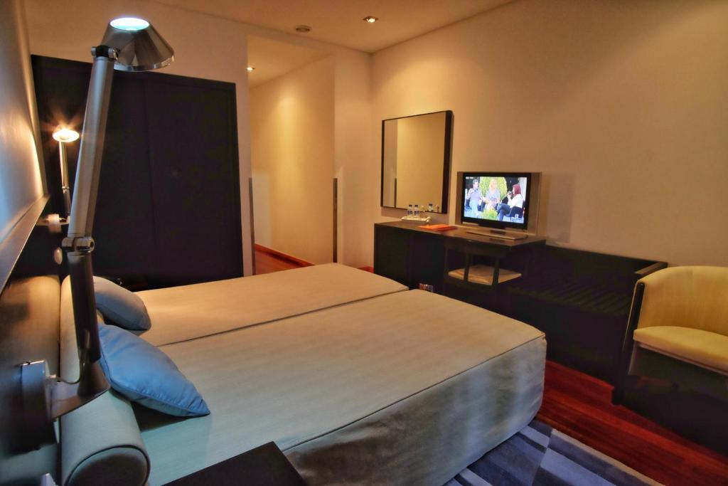 Двухместный (Двухместный номер с 1 кроватью или 2 отдельными кроватями) отеля Hotel Vila Luena, Вила-Верди
