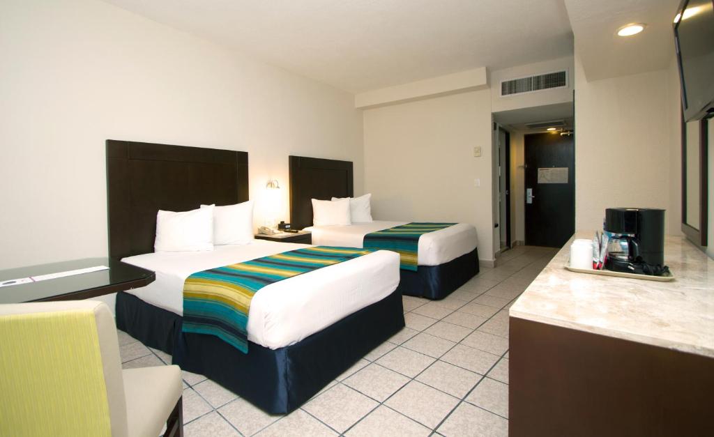 Двухместный (Двухместный номер с 2 двуспальными кроватями) курортного отеля Crown Paradise Club Cancun - Все включено, Канкун