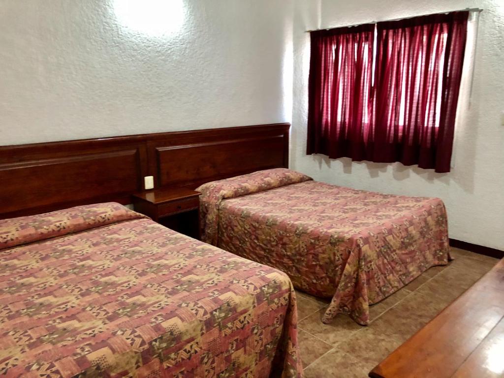 Двухместный (Стандартный двухместный номер с 2 отдельными кроватями) отеля hotel roma, Оахака-де-Хуарес