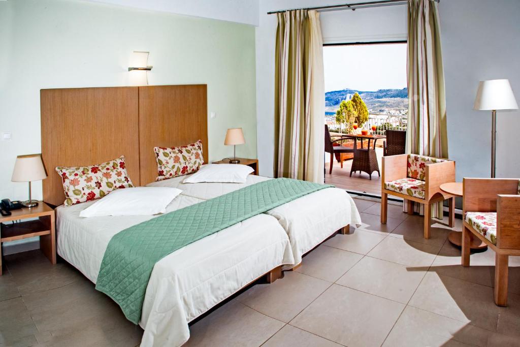 Двухместный (Двухместный номер с 1 кроватью или 2 отдельными кроватями и видом на море) отеля Kythea Resort, Агия-Пелагия, Аттика
