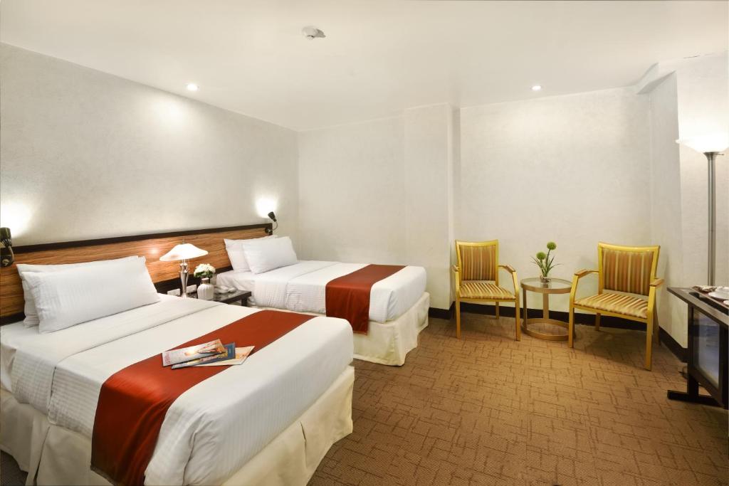 Двухместный (Двухместный номер Делюкс с 2 отдельными кроватями) отеля D Circle Hotel, Манила