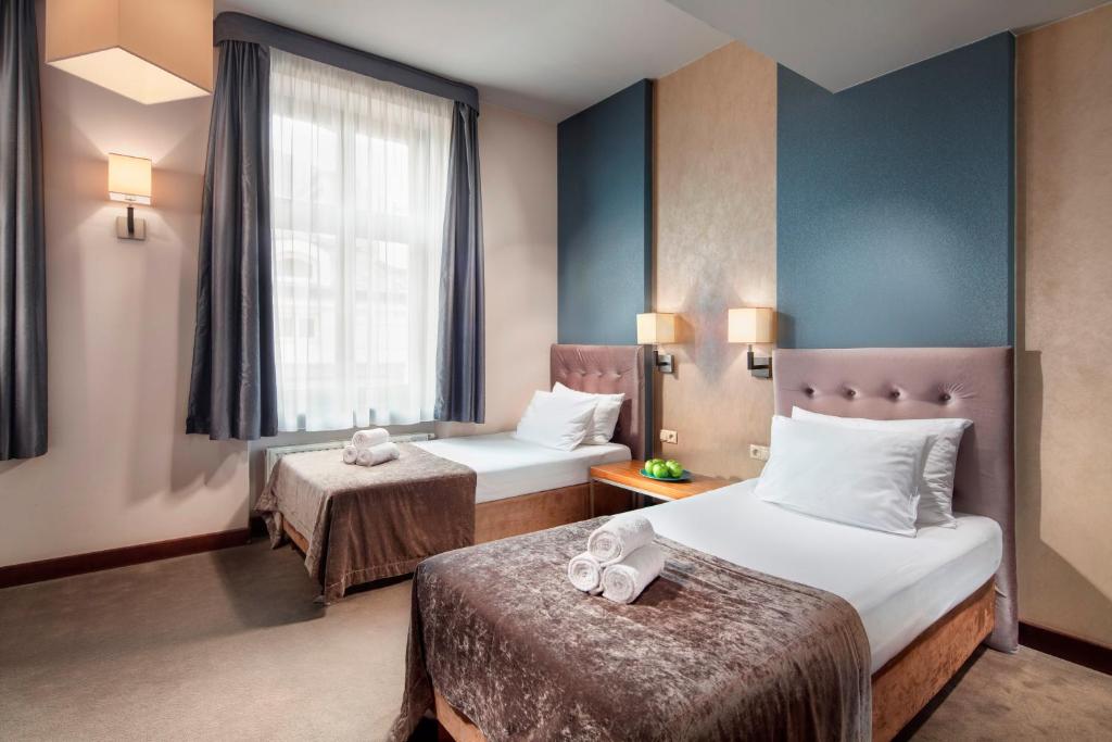 Двухместный (Двухместный номер с 2 отдельными кроватями) отеля Hotel Unicus, Краков
